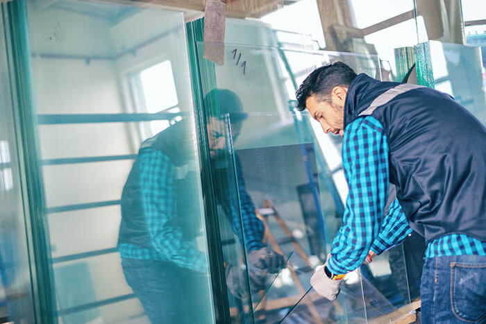 worker in a glass shop